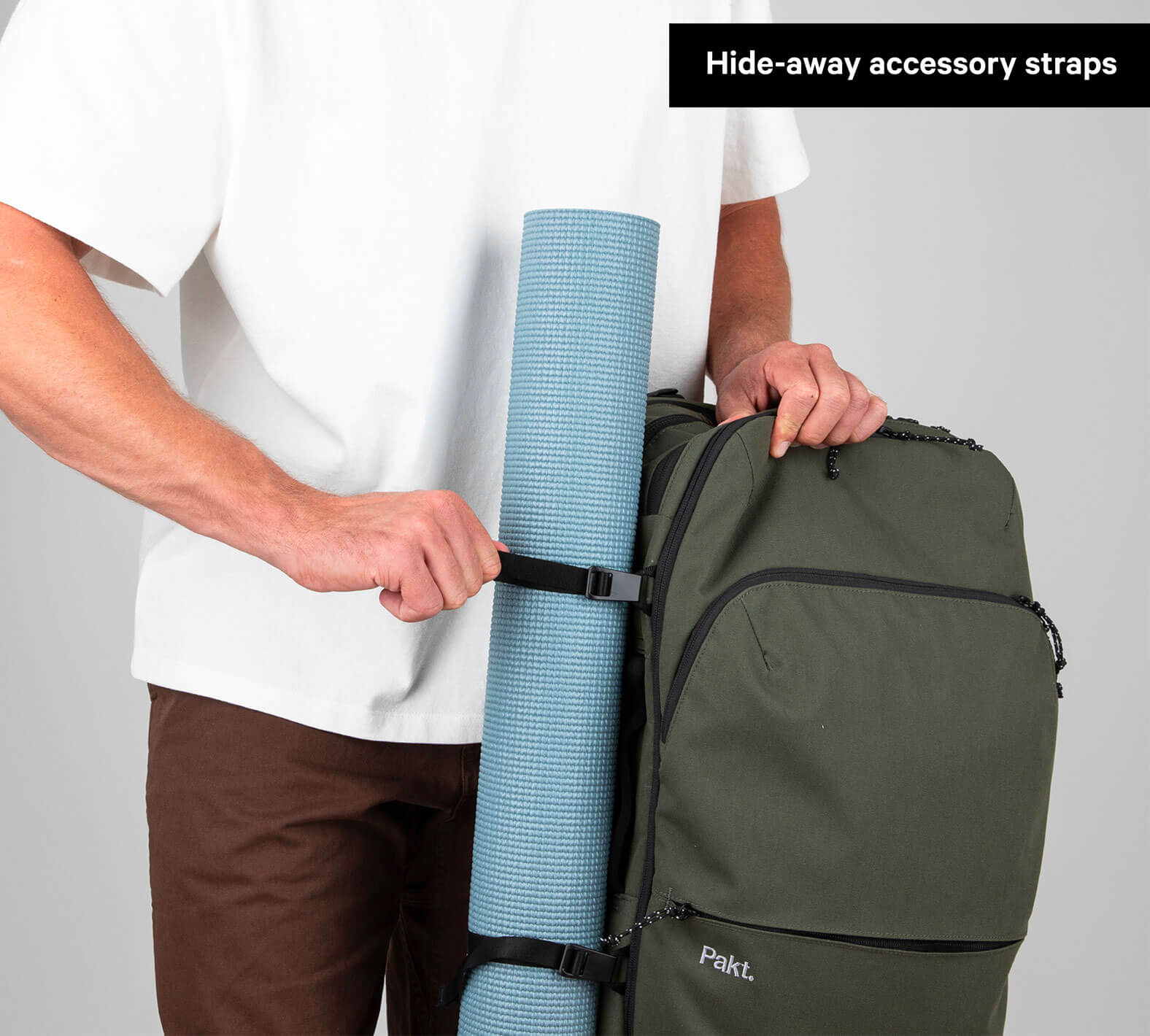 Travel Backpack Green storage space demonstrated with yoga mat