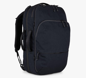 Black Pakt. backpack with padded shoulder straps, front zip pocket, and patterned rope zipper pulls.
