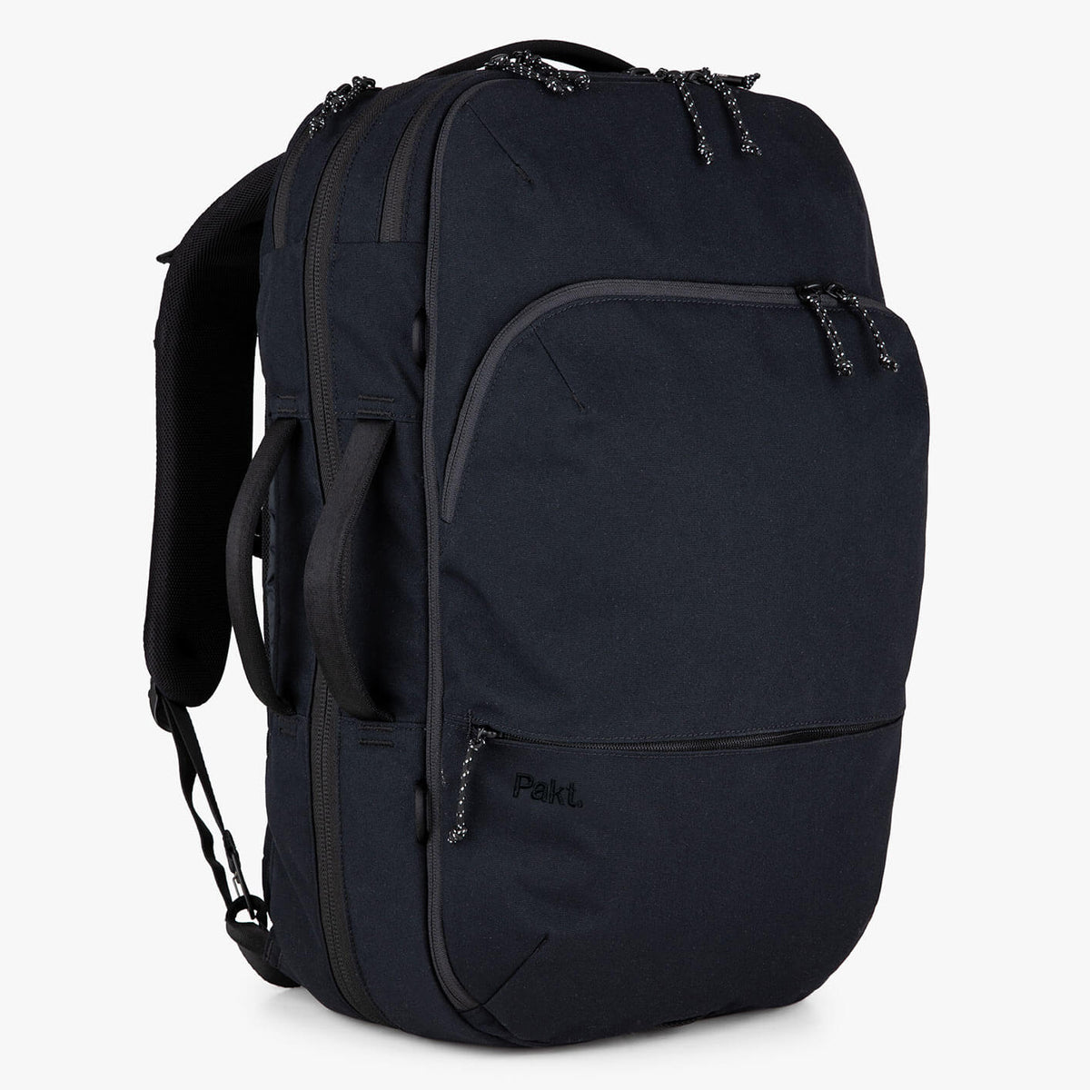 Black Pakt. backpack with padded shoulder straps, front zip pocket, and patterned rope zipper pulls.