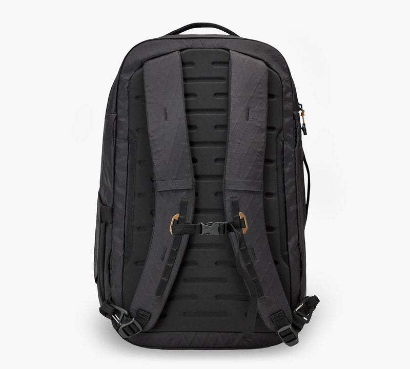 Back view of black backpack with padded shoulder straps, sternum strap buckle, and ventilated back panel.