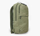 Three-quarter front view of Stash Packable Backpack 16L showcasing cypress recycled nylon and front zip pocket on white background