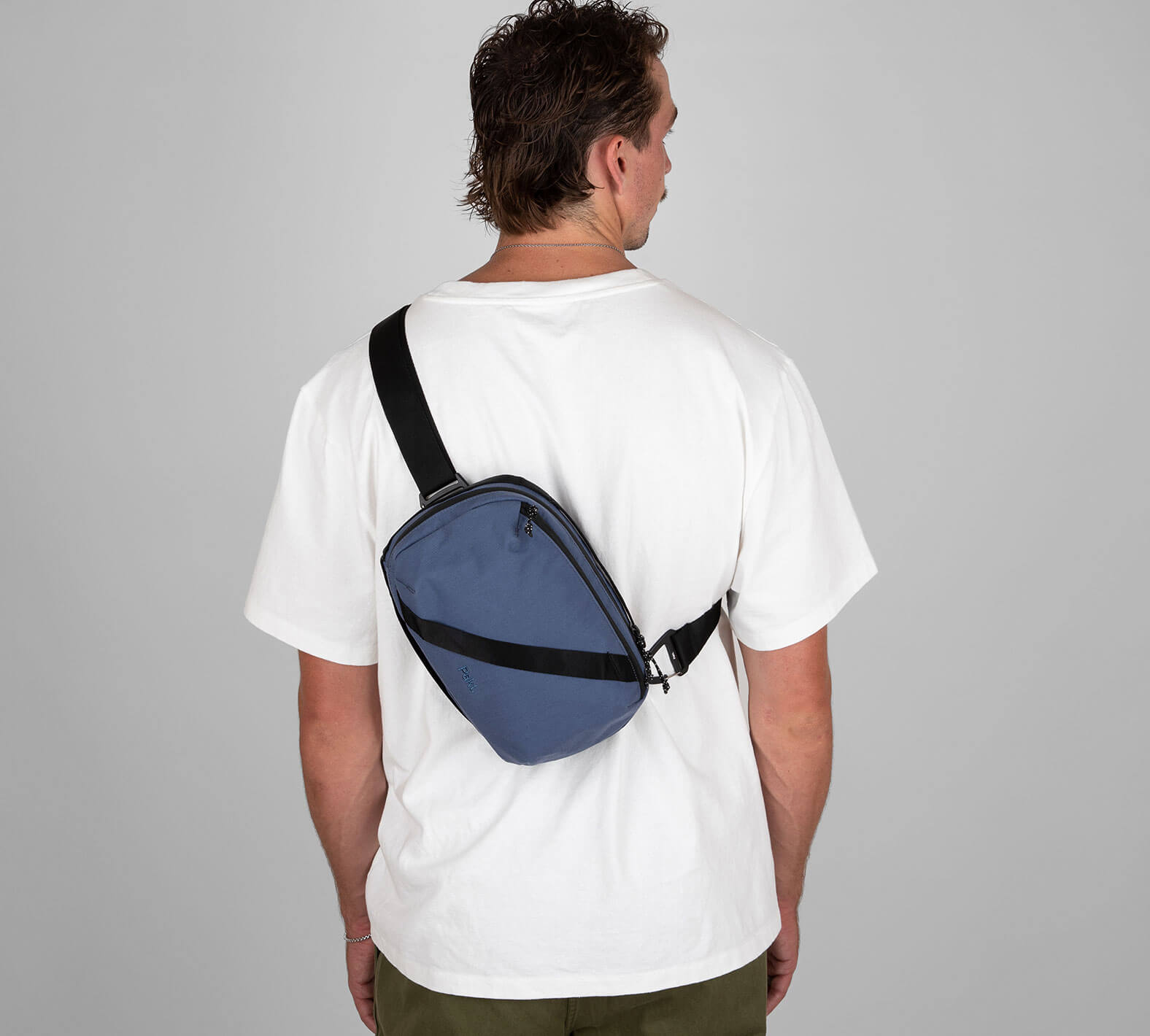 Male model with 5L Sling in Navy