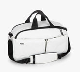 Three-quarter view of 25L Travel Duffel showing front dual pockets, removable padded shoulder strap, top handles, and Pakt logo