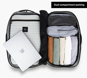 Travel Backpack Grey with laptop sleeve storage space demonstrated 