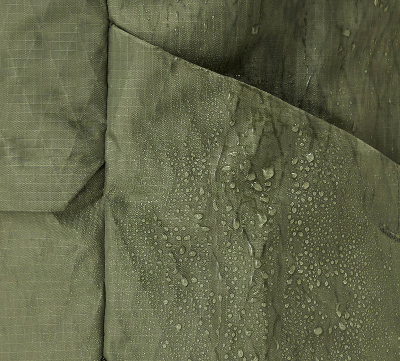 Close-up of the Aeroweave fabric in Cypress with water droplets, highlighting water-resistant material