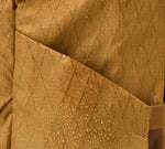 Close-up of the Aeroweave material with water droplets, highlighting water resistance of the Mojave Aero Travel System Pre-order Bundle.