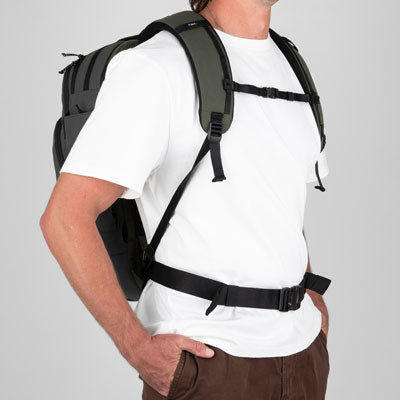 Man wearing Green Travel Back Pack