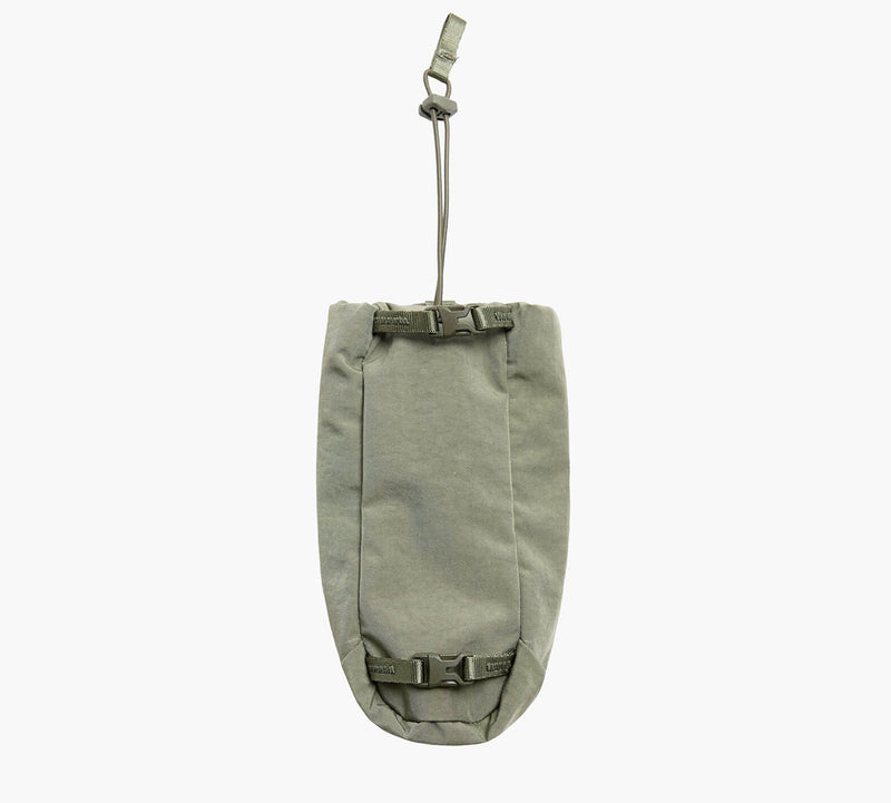 Front view of MODE Bottle Sleeve in Cypress showing buckle-fastened roll-top closure and adjustable hanging strap on white background