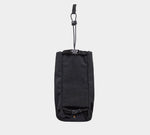 Front view of MODE Bottle Sleeve in black showing hanging strap with plastic clip and roll-top buckle on light gray background