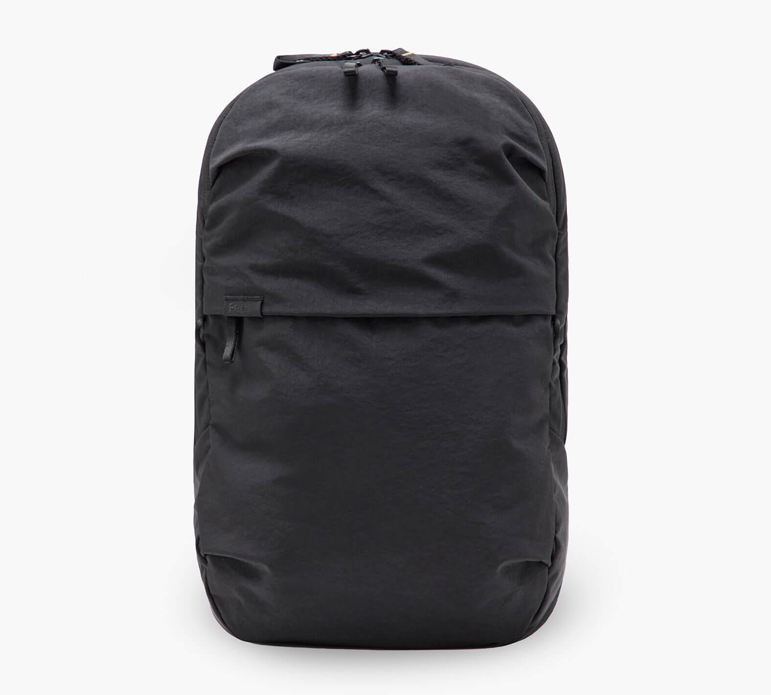 Front view of MODE Convertible Bag 14L in Black showcasing front zip pocket and top dual zippers on white background