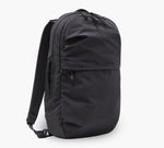 Black commuter backpack with padded shoulder straps, front zip pocket and top zip main compartment