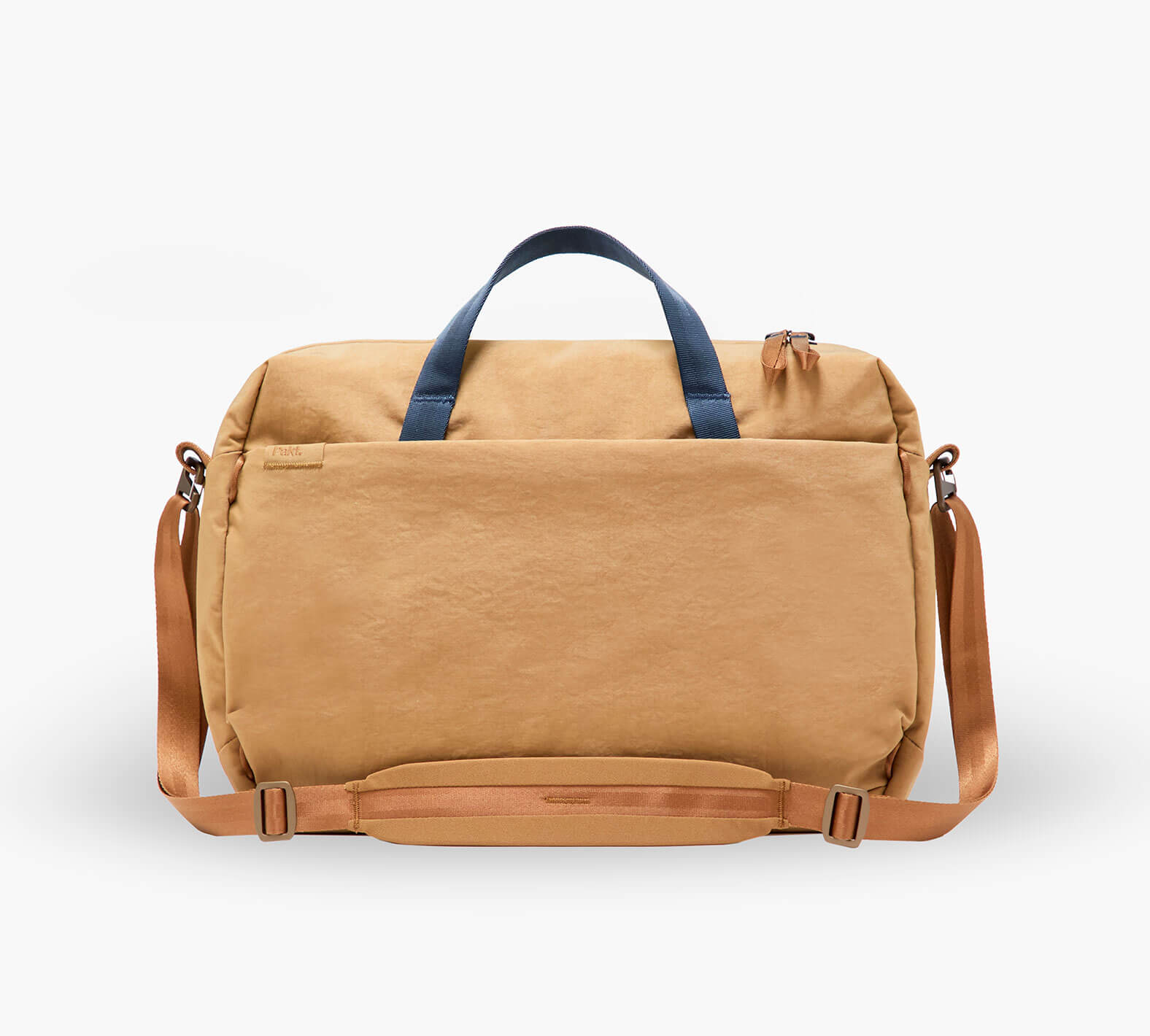 Tan canvas weekender duffel with navy top handles, adjustable tan shoulder strap, and front slip pocket.