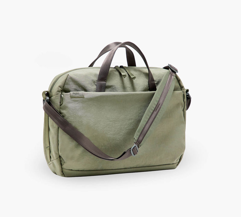 Olive-green canvas messenger shoulder bag with top handles, front zip pocket, and adjustable shoulder strap