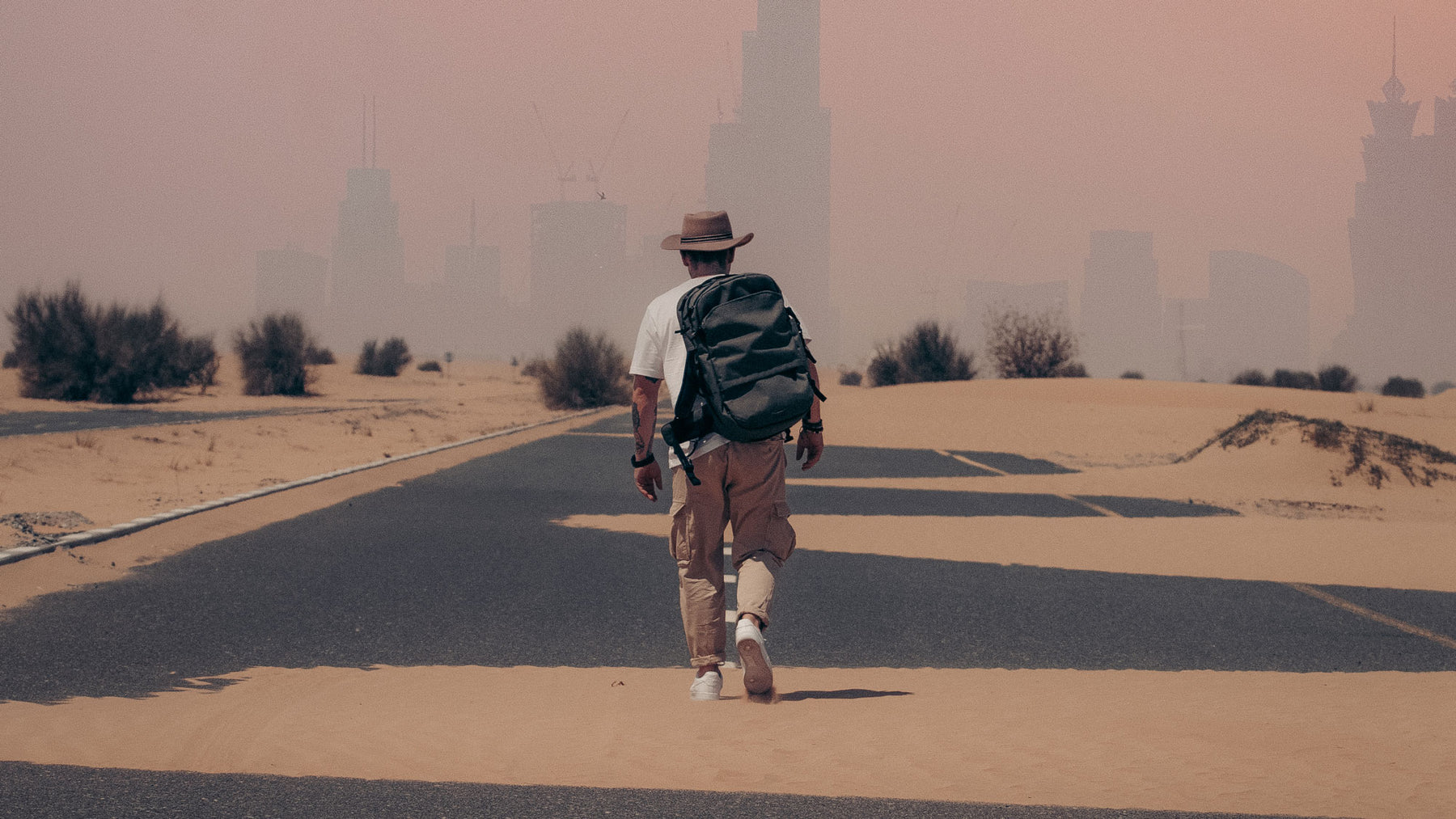 Pakt Travel Backpack in a city