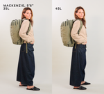 MACKENZIE, 5'6" 35L — model wearing Pakt One backpacks: 35L left, 45L right