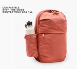 Sumac MODE Bottle Sleeve attached to MODE Convertible Bag 14L with white bottle, overlay reads Compatible with MODE 14L