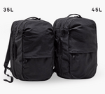 Two black travel backpacks side-by-side, left labeled 35L and right labeled 45L, showing size and shape differences.