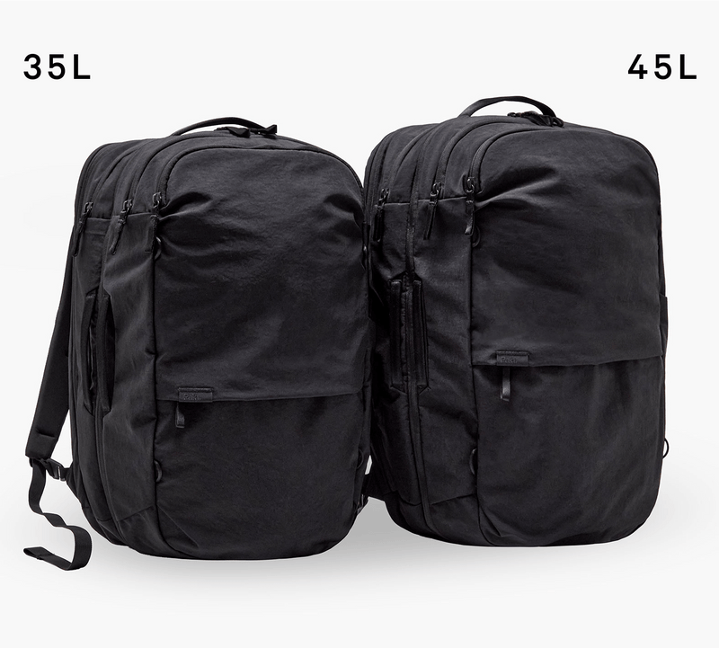 Two black travel backpacks side-by-side, left labeled 35L and right labeled 45L, showing size and shape differences.