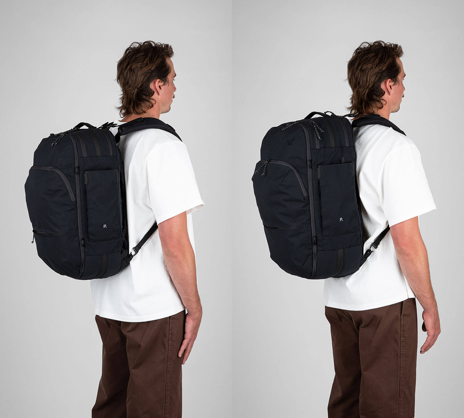 man wearing black travel backpack