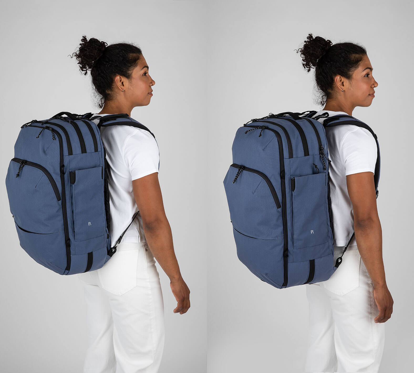 woman wearing blue travel backpack