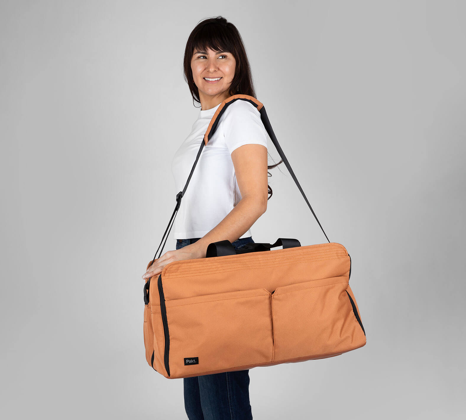 Woman with The Anywhere 25L Duffel
