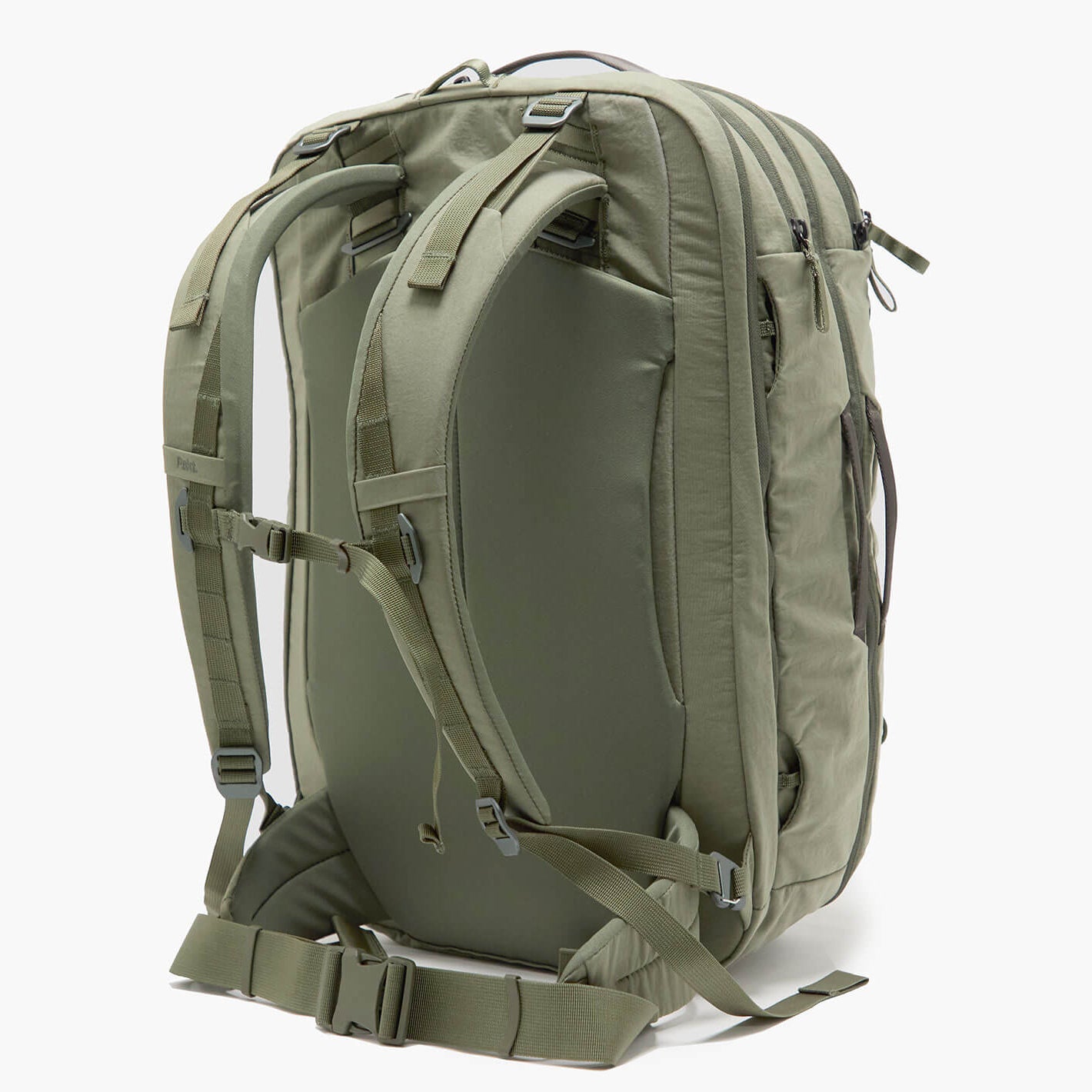Rear view of Pakt One Travel Backpack in cypress showing padded back, adjustable harness, sternum strap and hip belt on white