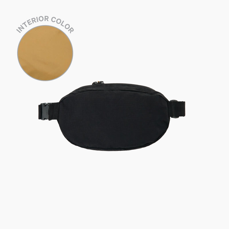 The Stash 4L Sling in Black on a white background. To the left there is a circular swatch showing the interior color of Mojave.