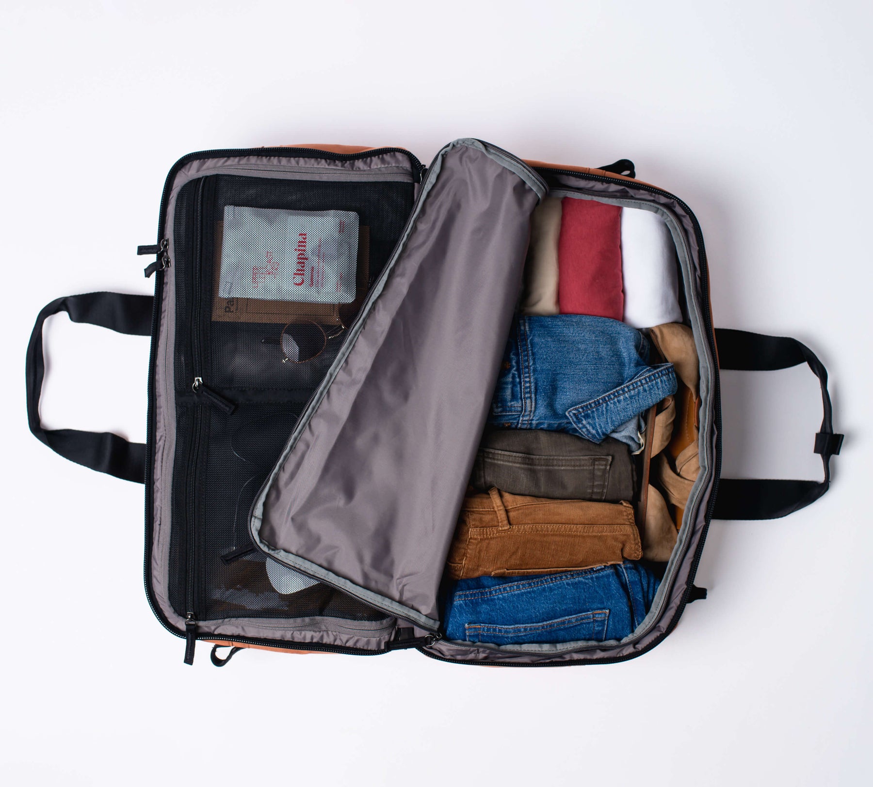 pack clothes into one half of the large interior compartments