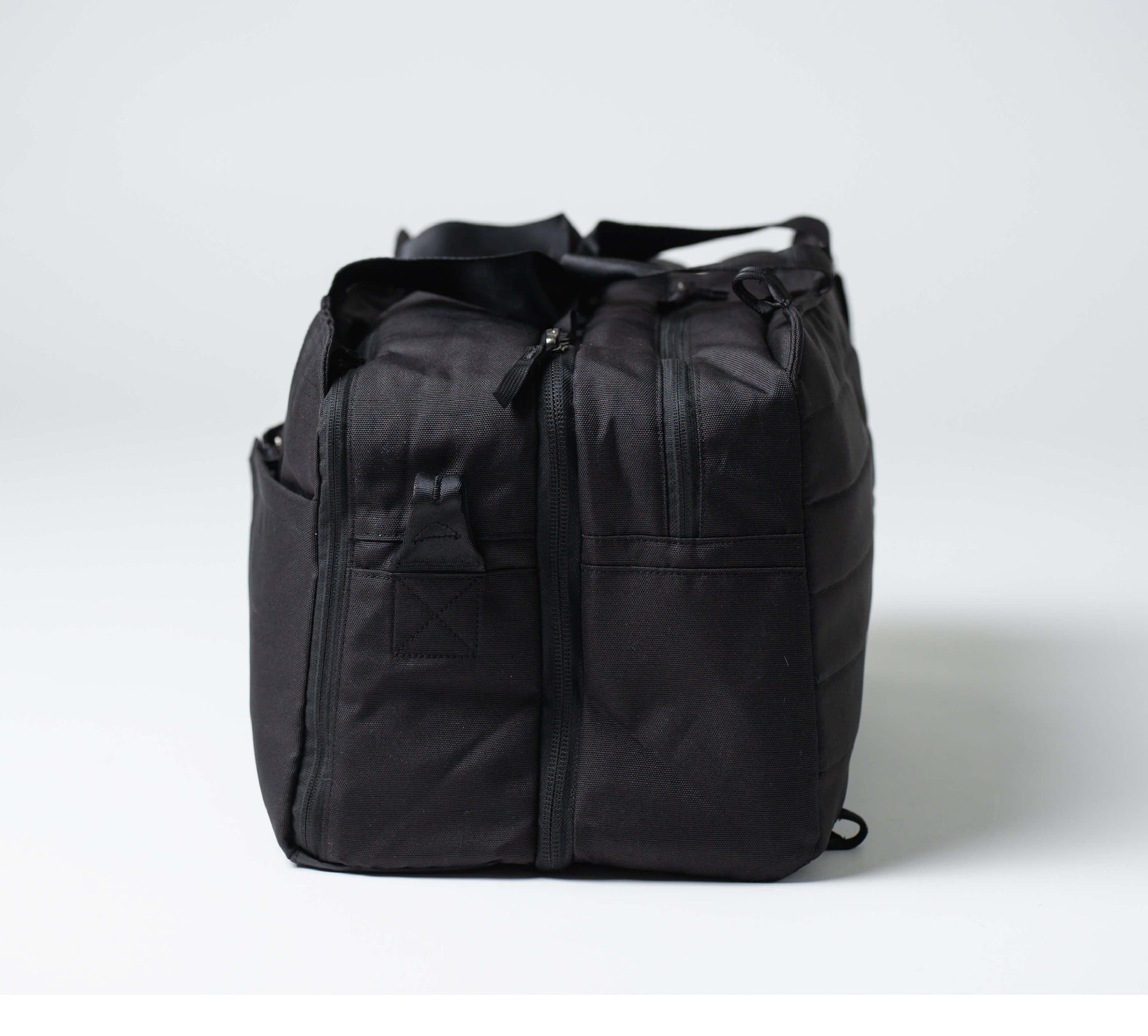 side view of the 50L anywhere duffel/backpack
