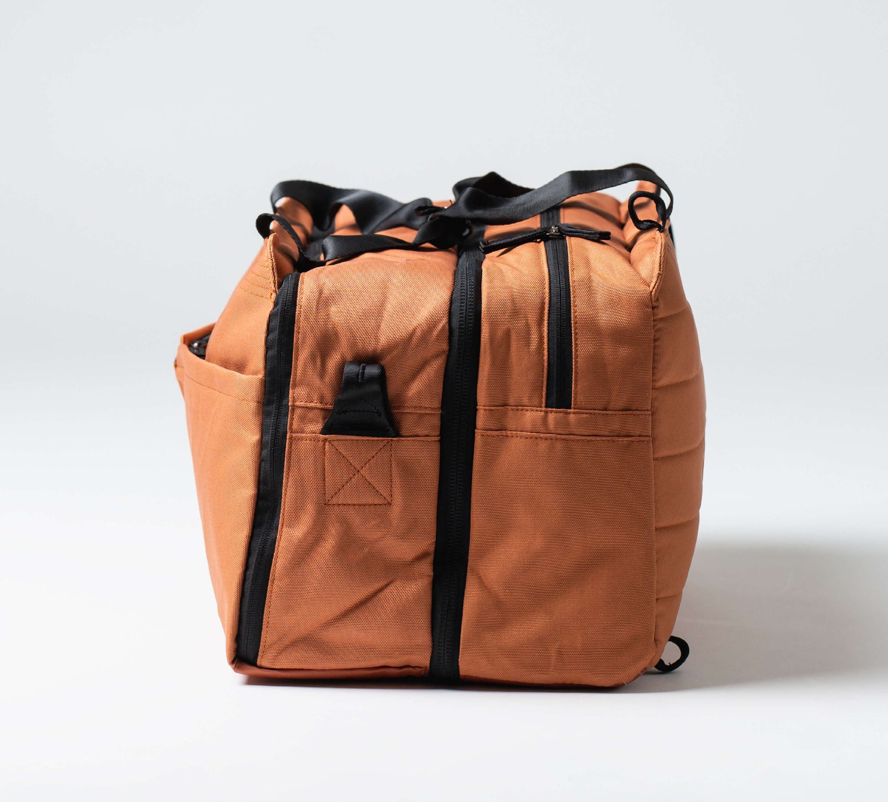 side view of the 50L Anywhere Duffel / Backpack hybrid bag