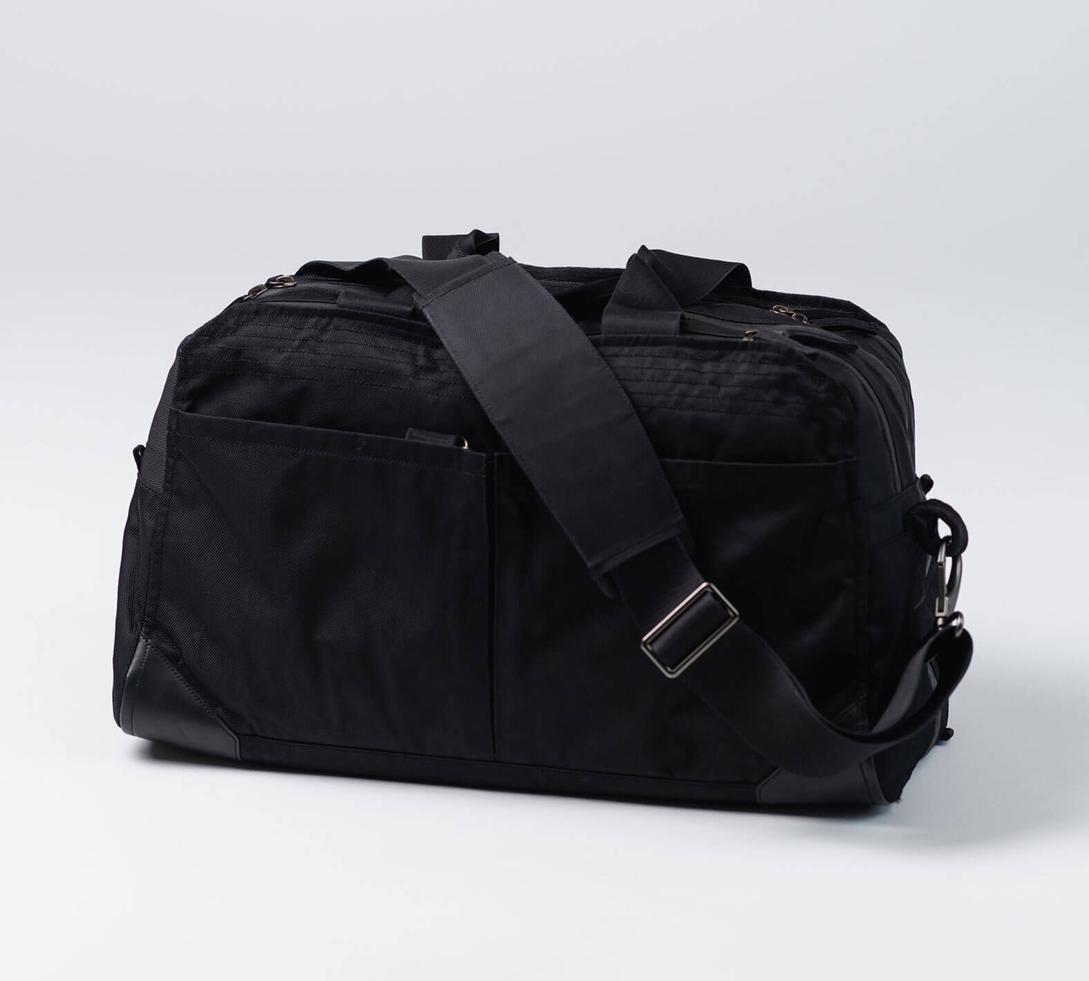 the pakt one duffel with adjustable shoulder strap in black